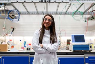 A smiling female scientist